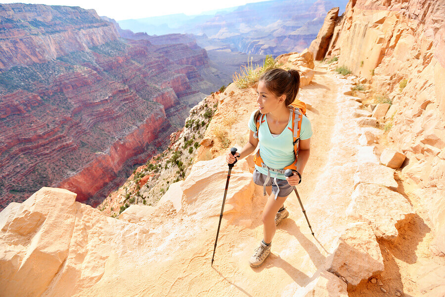 A woman hiking in a mountain