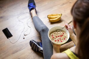 A girl eating a vegan breakfast.