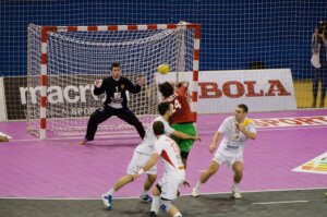 A handball game indoors.