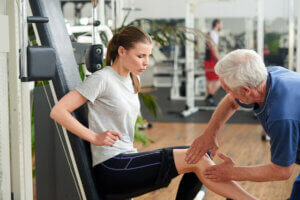 A woman receiving treatment for knee bursitis.