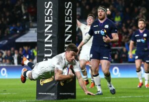 An England player scoring a try.
