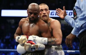 McGregor and Mayweather fighting.
