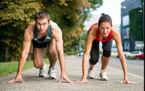Two runners about to start a race.