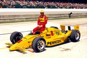 Rick Mears on his yellow car.