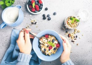 Some cereal, milk and fruit.