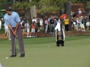 Tiger Woods making a put.