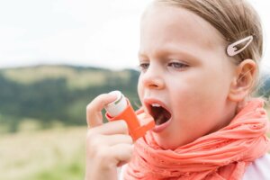Asthmatic girl with inhaler