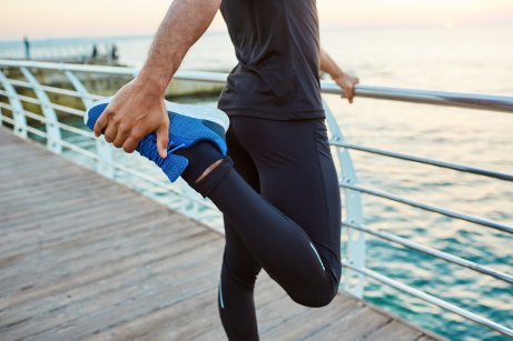 A man stretching his quads