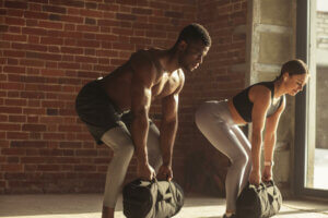 5 Basic Sandbag Exercises to Add to Your Routine