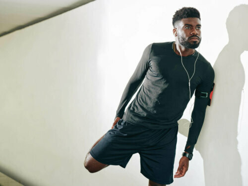 An athlete stretching before exercising.