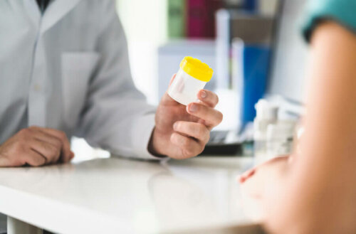 A doctor prescribing drugs to their patient.
