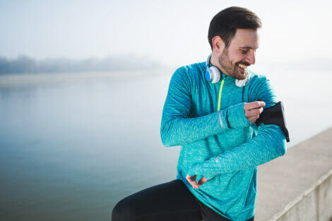 A man getting ready to go running while listening to music