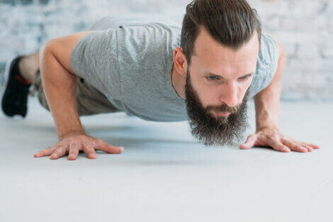 A man doing push ups to strengthen his triceps