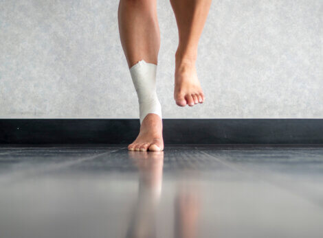 A man doind proprioceptive balance exercises to recover the sensation in his injured ankle
