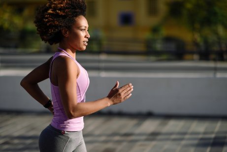 A self-motivated woman jogging