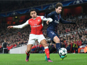 Two soccer players on the field.