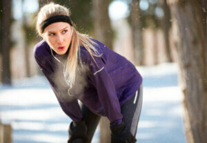 A woman running to increase lung capacity.