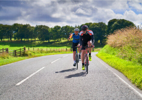 Two cyclists training on road