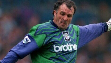 John Burridge playing football.