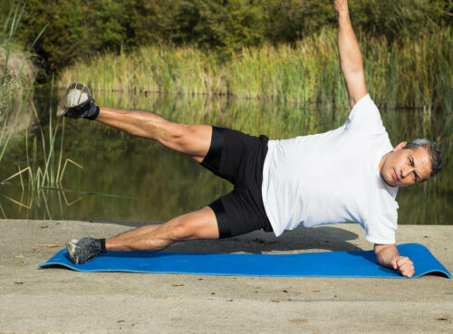 A man doing a side plank.