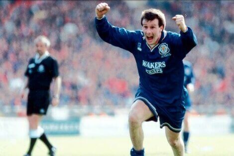 Steve Claridge cheering during a match.