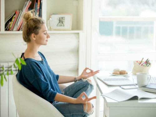 A young woman meditating.