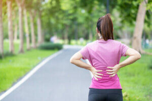 A woman with back pain.