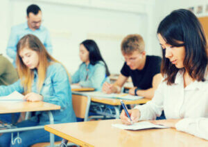 High school students working in class.