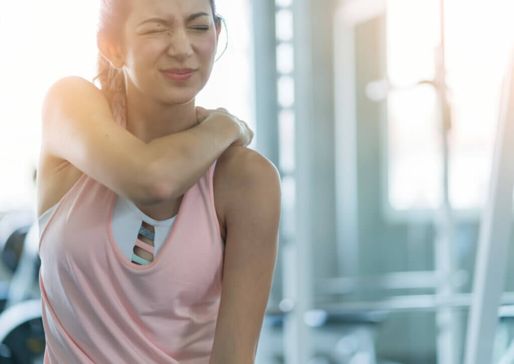 muscular pain woman back injury