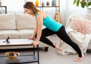 A woman training at home.