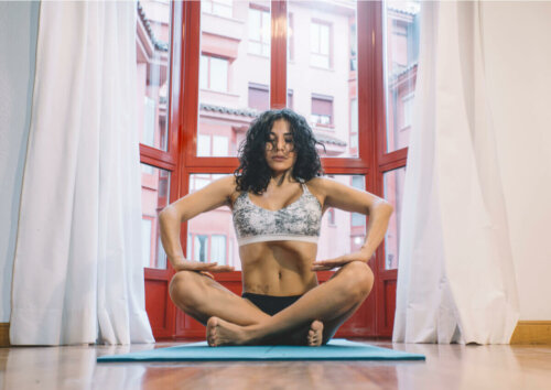 A woman doing diaphragmatic breathing.