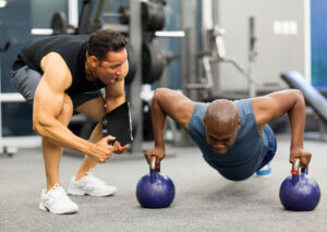 Pushups with personal trainer