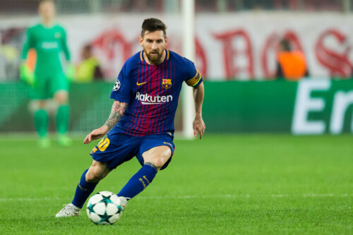 Lionel messi playing for Barcelona.
