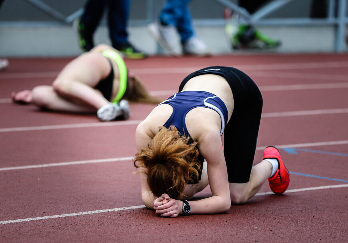 A woman feels bad after losing a race.