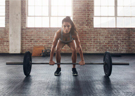 A woman lifting weights.