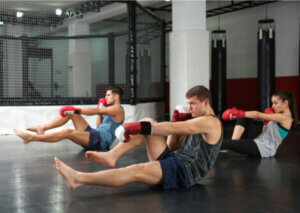 A group of people practising body combat.