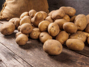 A pile of potatoes, which are good to include in an astringent diet.