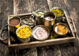 Different foods in cans.