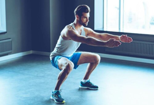 A man doing squats.