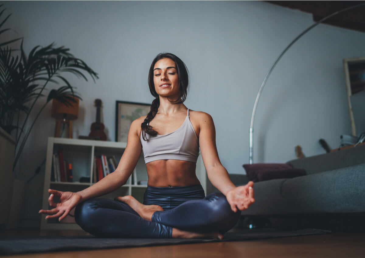 A woman doing yoga.