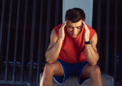 A male athlete using mindfulness for concentration.