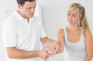 A woman being treated for a metacarpal fracture.