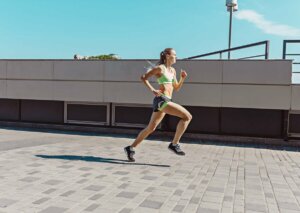 A woman running through the streets.