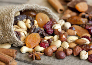 An assortment of nuts and dried fruit.