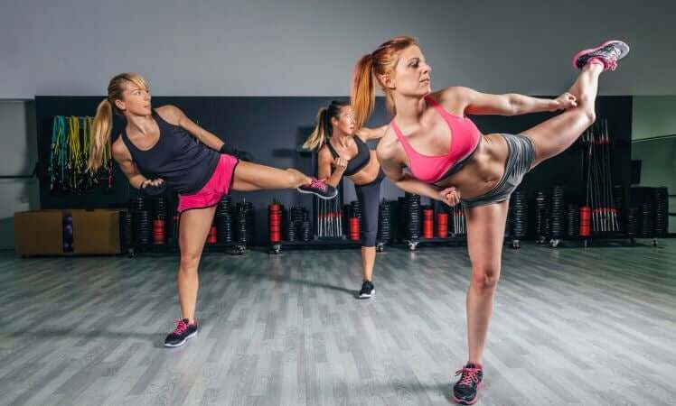 Women in a body combat class.