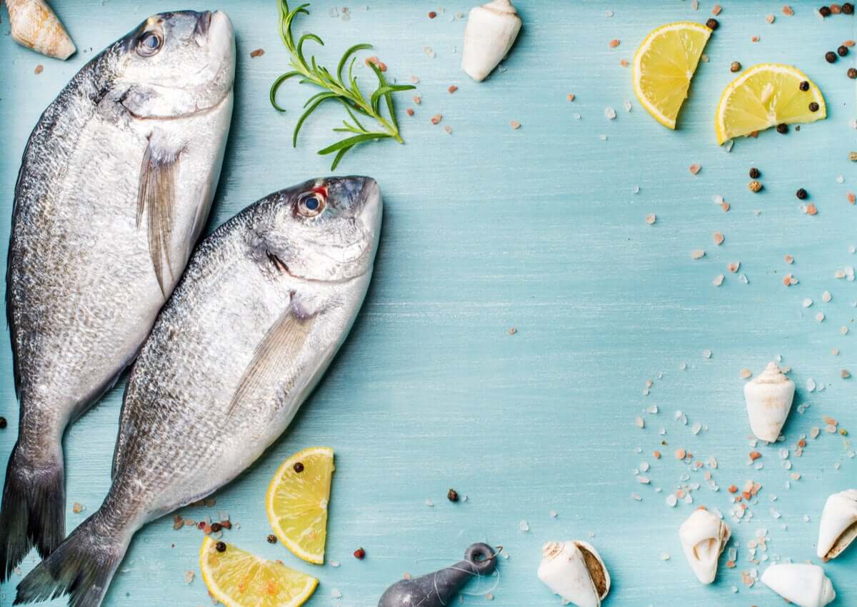 oily fish, lemon slices, and rosemary.
