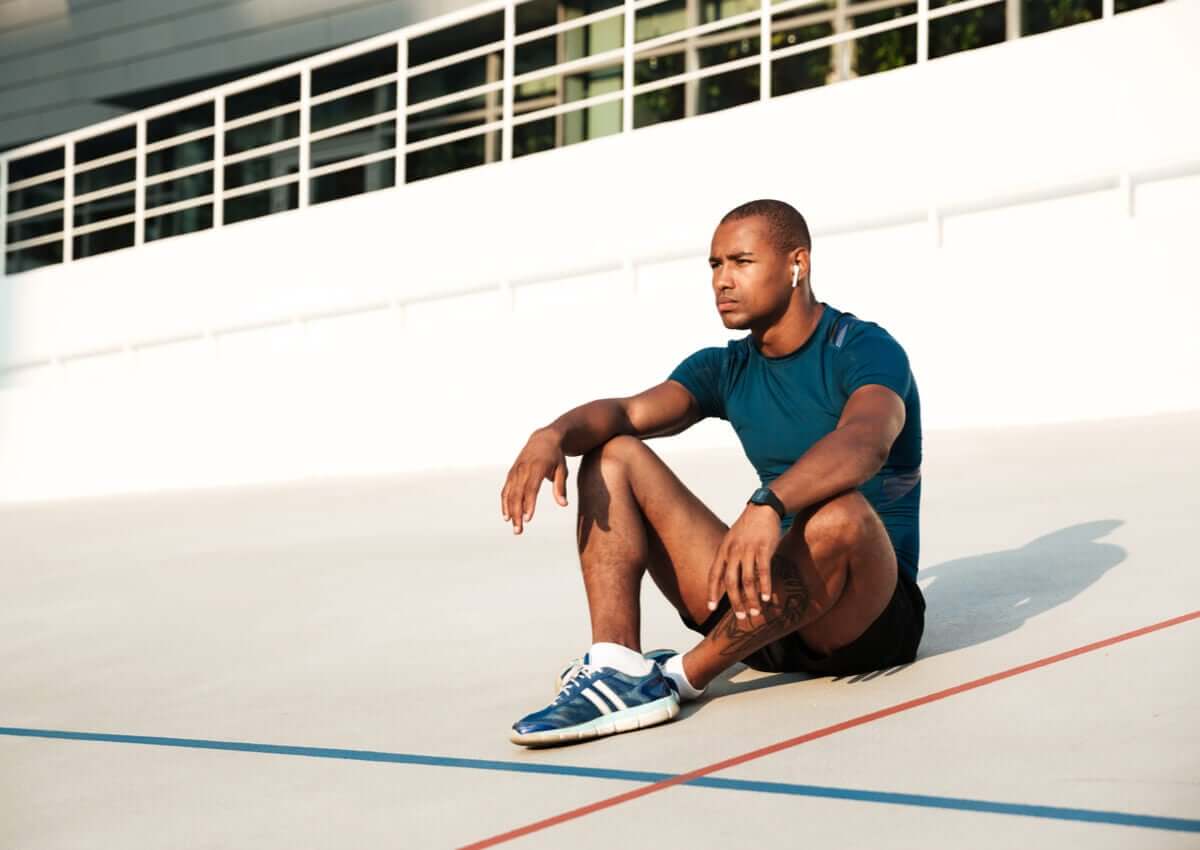 An athlete thinking.