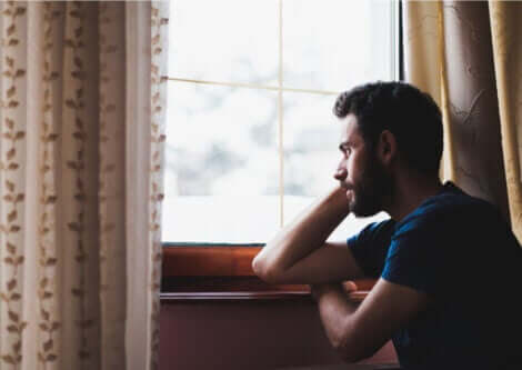 A man looking out the window.