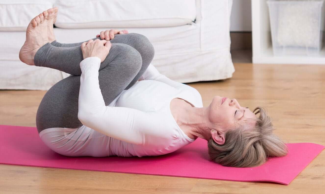 A woman doing yoga for low back pain.